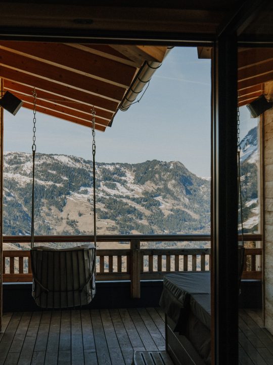 Kamin mit Feuerholz im Bergchalet Gastein